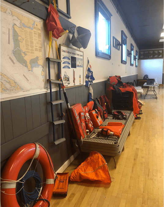 Life jackets and safety equipment in a marine training room